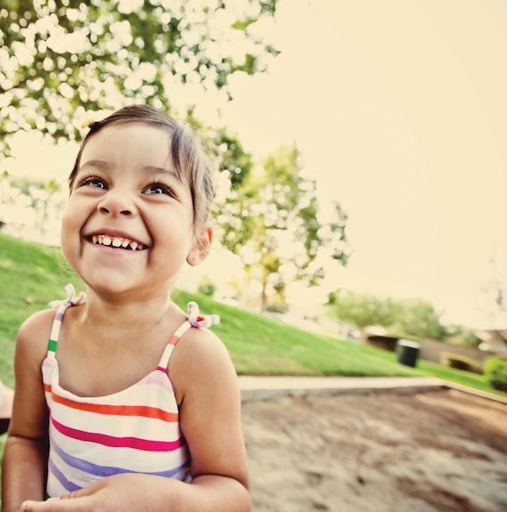 smiling pre-schooler at childcare